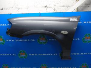 Used Front wing, left Nissan Almera (N16) 1.5 16V Price € 68,25 Margin scheme offered by Maresia Auto Recycling B.V.