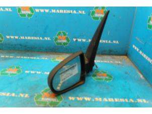 Used Wing mirror, left Mitsubishi Colt CZC 1.5 16V Price € 63,00 Margin scheme offered by Maresia Auto Recycling B.V.