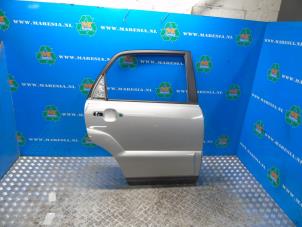 Gebrauchte Tür 4-türig rechts hinten Kia Sportage (JE) 2.0 CVVT 16V 4x4 Preis € 157,50 Margenregelung angeboten von Maresia Auto Recycling B.V.