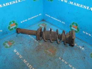 Used Rear shock absorber rod, left Nissan Almera (N16) 1.8 16V Price € 42,00 Margin scheme offered by Maresia Auto Recycling B.V.