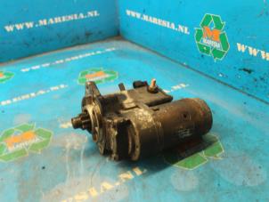 Starter from a Hyundai Santa Fe I 2.0 CRDi 16V 4x4 2005