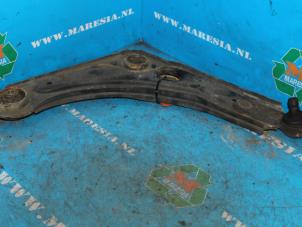 Used Front lower wishbone, right Ford Escort 6 (AAL/ABL) 1.8 TD Price € 36,75 Margin scheme offered by Maresia Auto Recycling B.V.