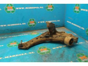 Used Front lower wishbone, left Volkswagen Fox (5Z) 1.4 TDI Price € 31,50 Margin scheme offered by Maresia Auto Recycling B.V.