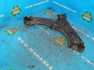 Used Front lower wishbone, right Opel Corsa D 1.2 16V Price € 42,00 Margin scheme offered by Maresia Auto Recycling B.V.