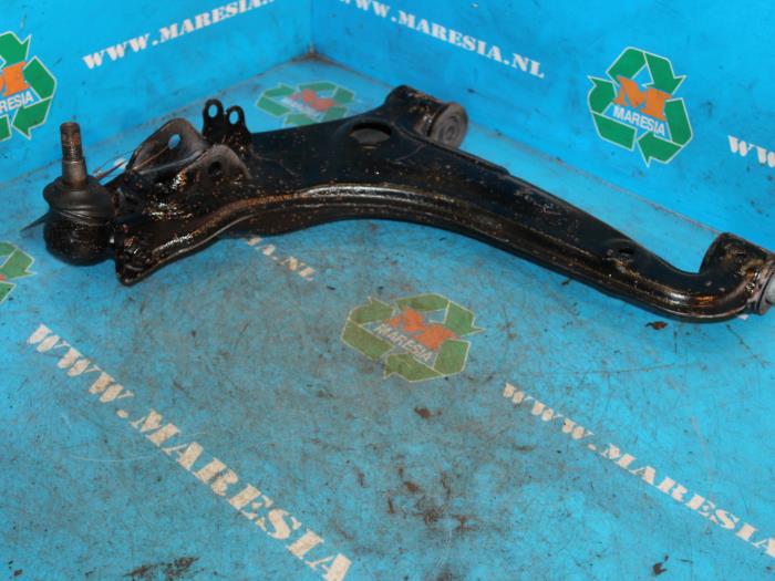 Front lower wishbone, left from a Mazda MX-5 (NB18/35/8C) 1.8i 16V 1999