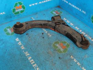 Used Front lower wishbone, right Daihatsu Cuore (L251/271/276) 1.0 12V DVVT Price € 42,00 Margin scheme offered by Maresia Auto Recycling B.V.