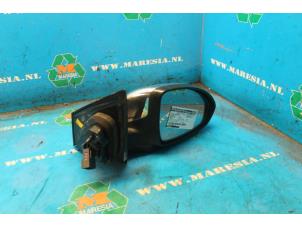 Used Wing mirror, right Chevrolet Cruze Price € 78,75 Margin scheme offered by Maresia Auto Recycling B.V.