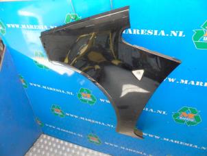 Used Front wing, left Mitsubishi Colt CZC 1.5 16V Price € 47,25 Margin scheme offered by Maresia Auto Recycling B.V.