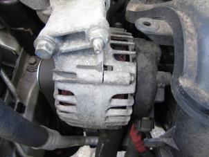 Begagnade Dynamo Ford Fiesta 6 (JA8) 1.25 16V Pris € 52,50 Marginaltabell erbjuds av Maresia Auto Recycling B.V.