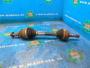 Used Front drive shaft, left Opel Astra J Sports Tourer (PD8/PE8/PF8) 2.0 CDTI 16V 165 Price € 78,75 Margin scheme offered by Maresia Auto Recycling B.V.