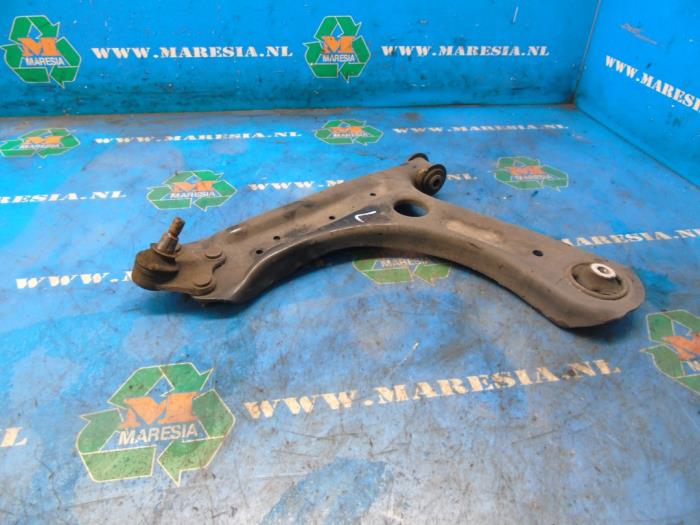 Front lower wishbone, left from a Volkswagen Polo V (6R) 1.4 TDI DPF BlueMotion technology 2014
