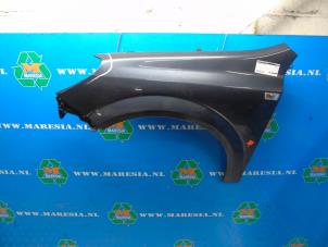 Used Front wing, left Opel Astra H GTC (L08) 1.6 16V Price € 73,50 Margin scheme offered by Maresia Auto Recycling B.V.