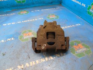 Used Front brake calliper, right Toyota Yaris III (P13) 1.33 16V Dual VVT-I Price € 52,50 Margin scheme offered by Maresia Auto Recycling B.V.