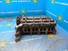 Cylinder head from a Opel Astra J Sports Tourer (PD8/PE8/PF8) 1.6 CDTI 16V 2015