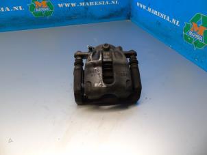 Used Front brake calliper, right Nissan Micra (K14) 1.0 12V Price € 47,25 Margin scheme offered by Maresia Auto Recycling B.V.