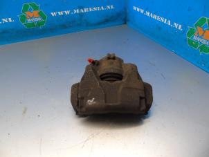 Used Front brake calliper, right Dacia Duster (HS) 1.2 TCE 16V Price € 36,75 Margin scheme offered by Maresia Auto Recycling B.V.