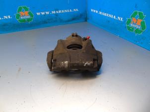 Used Front brake calliper, left Dacia Duster (HS) 1.2 TCE 16V Price € 36,75 Margin scheme offered by Maresia Auto Recycling B.V.