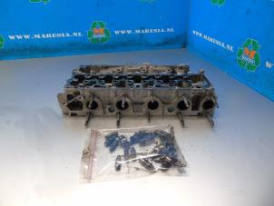 Used Cylinder head Peugeot Partner (EF/EU) 1.6 BlueHDI 75 Price € 367,50 Margin scheme offered by Maresia Auto Recycling B.V.