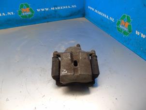 Used Front brake calliper, left Lexus CT 200h 1.8 16V Price € 47,25 Margin scheme offered by Maresia Auto Recycling B.V.