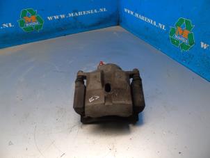 Used Front brake calliper, right Lexus CT 200h 1.8 16V Price € 47,25 Margin scheme offered by Maresia Auto Recycling B.V.