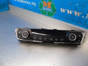 Used Heater control panel BMW 1 serie (F20) 116i 1.6 16V Price € 131,25 Margin scheme offered by Maresia Auto Recycling B.V.