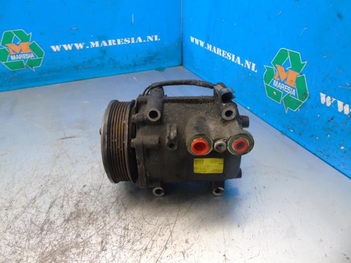 Usagé Pompe clim Ford Fiesta 6 (JA8) 1.4 TDCi Prix € 105,00 Règlement à la marge proposé par Maresia Auto Recycling B.V.
