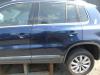 Rear door 4-door, left from a Volkswagen Tiguan (5N1/2) 2.0 TDI 16V Blue Motion 2014