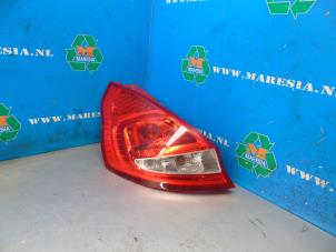 Used Taillight, left Ford Fiesta 6 (JA8) 1.25 16V Price € 42,00 Margin scheme offered by Maresia Auto Recycling B.V.
