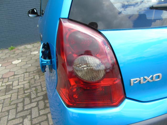 Taillight, left from a Nissan Pixo (D31S) 1.0 12V 2010