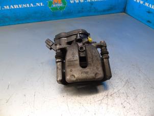 Used Rear brake calliper, right Nissan Juke (F16) 1.0 DIG-T 12V Price € 105,00 Margin scheme offered by Maresia Auto Recycling B.V.