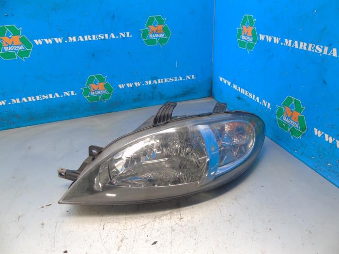 Używane Reflektor lewy Chevrolet Lacetti (KLAN) 1.6 16V Cena € 52,50 Procedura marży oferowane przez Maresia Auto Recycling B.V.