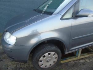 Used Front wing, left Volkswagen Touran (1T1/T2) 1.6 Price € 63,00 Margin scheme offered by Maresia Auto Recycling B.V.