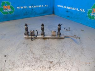 Used Fuel injector nozzle Mitsubishi Space Star (A0) 1.0 12V Price € 52,50 Margin scheme offered by Maresia Auto Recycling B.V.
