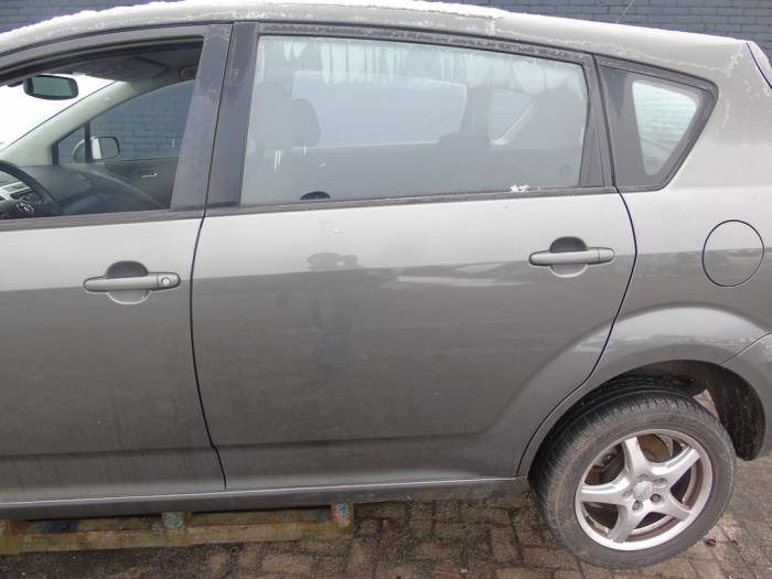Rear door 4-door, left from a Toyota Corolla Verso (R10/11) 1.8 16V VVT-i 2006