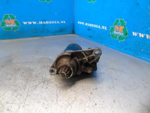 Starter from a Volkswagen Polo IV (9N1/2/3) 1.2 12V 2005