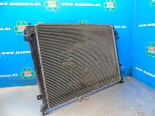 Radiator from a Kia Carens III (FG) 2.0 CRDI VGT 16V 2010