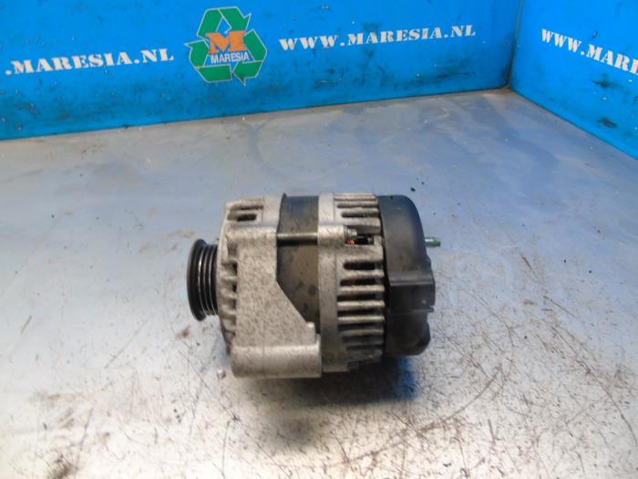 Begagnade Dynamo Chevrolet Aveo (250) 1.2 16V Pris € 15,75 Marginaltabell erbjuds av Maresia Auto Recycling B.V.