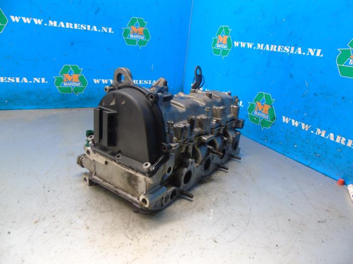Cylinder head from a Seat Leon (1P1) 1.2 TSI 2013