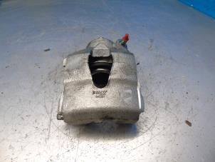 Used Front brake calliper, left Seat Leon (1P1) 1.4 16V Price € 47,25 Margin scheme offered by Maresia Auto Recycling B.V.