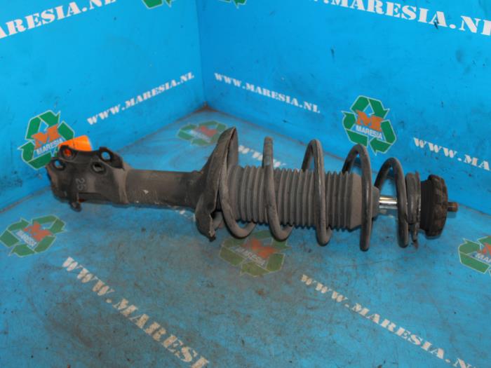 Front shock absorber rod, right from a Seat Arosa (6H1) 1.0 MPi 1998
