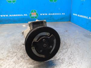 Compresseur de clim d'un Opel Astra J (PC6/PD6/PE6/PF6) 1.6 16V 2011