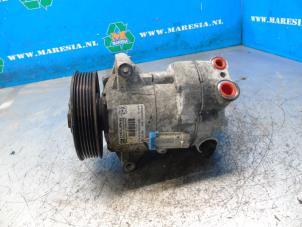 Compresseur de clim d'un Opel Astra J (PC6/PD6/PE6/PF6) 1.6 16V 2011