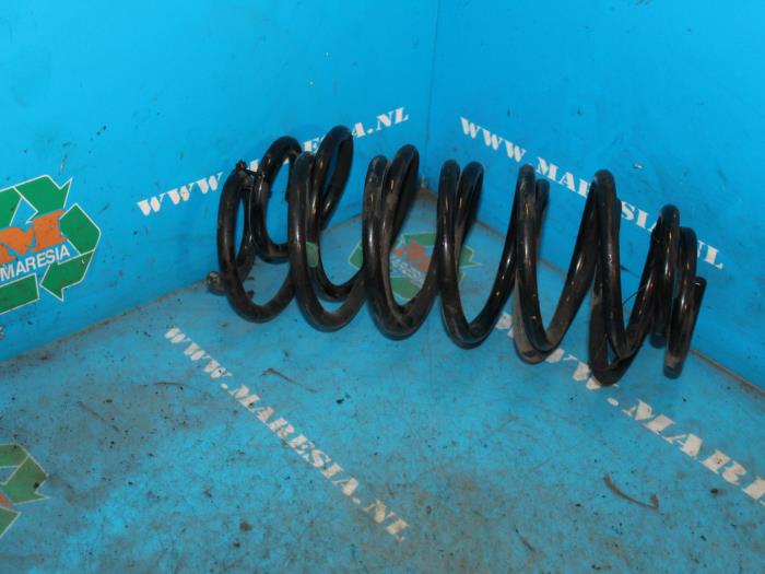 Rear coil spring from a Toyota Aygo (B10) 1.0 12V VVT-i 2005