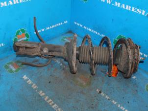 Used Front shock absorber rod, left Nissan Serena (C23) 1.6 16V Price € 47,25 Margin scheme offered by Maresia Auto Recycling B.V.