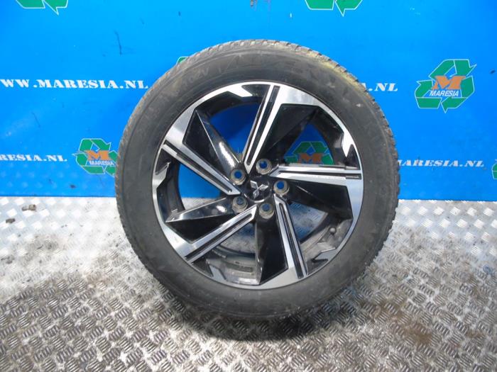 Używane Obrecz + Opona Mitsubishi Eclipse Cross (GK/GL) 2.4 16V PHEV 4x4 Cena € 315,00 Procedura marży oferowane przez Maresia Auto Recycling B.V.