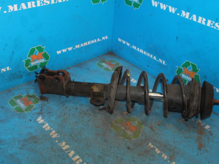 Front shock absorber rod, left from a Opel Combo (Corsa C) 1.7 DTI 16V 2002