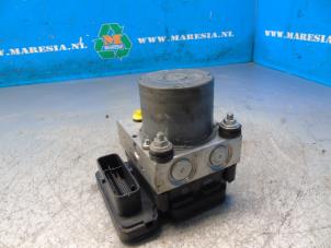 ABS pump from a Volkswagen Polo V (6R) 1.4 TDI 12V 90 2015