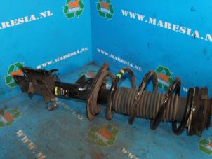 Used Rear shock absorber rod, right Nissan Qashqai (J10) 1.6 16V Price € 105,00 Margin scheme offered by Maresia Auto Recycling B.V.