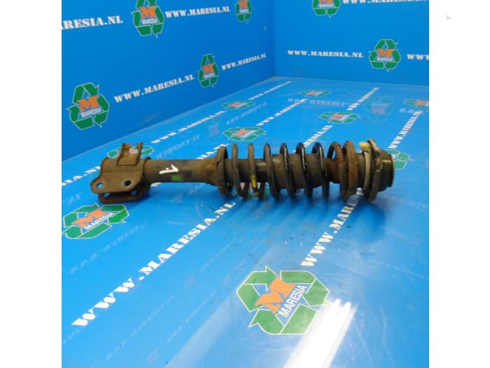 Front shock absorber rod, left from a Opel Agila (A) 1.0 12V Twin Port 2004