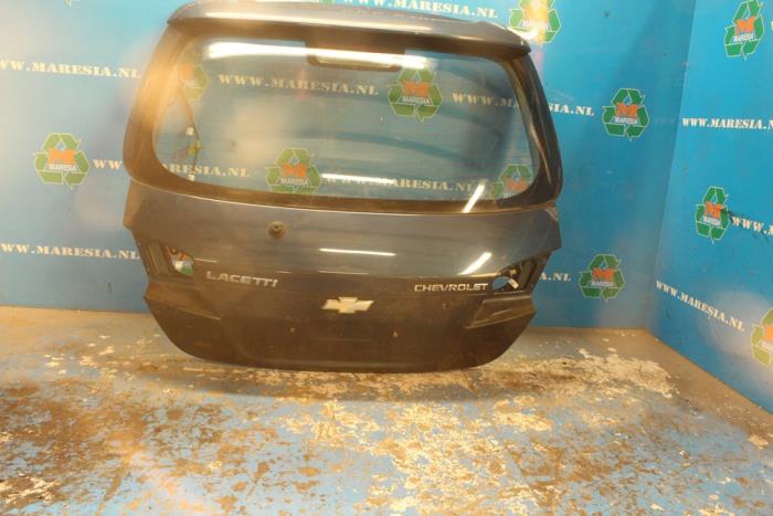 Używane Tylna klapa Chevrolet Lacetti (KLAN) 2.0 TDCi 16V Cena € 105,00 Procedura marży oferowane przez Maresia Auto Recycling B.V.
